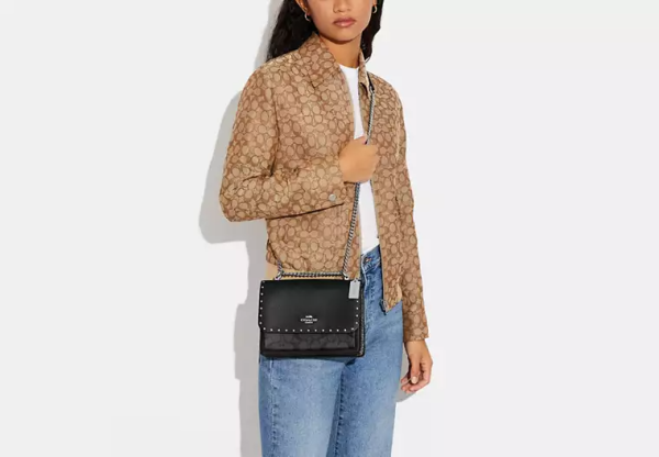 Klare Crossbody Bag In Signature Canvas With Rivets