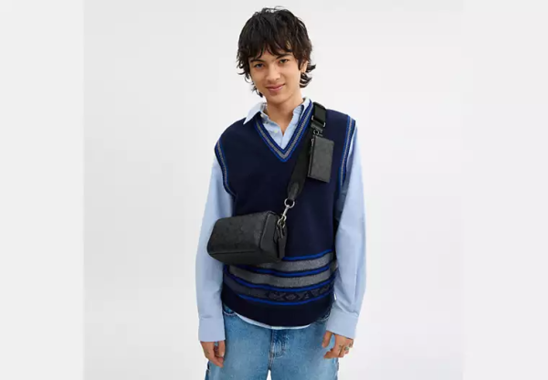 Axel Crossbody Bag In Signature Canvas