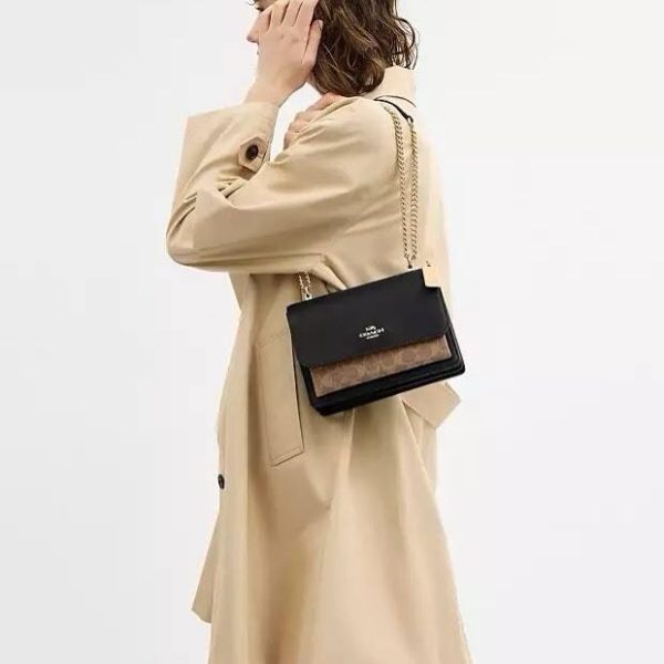 Coach Klare Crossbody Bag In Signature Canvas Brass/Tan/Black Multi worn side view