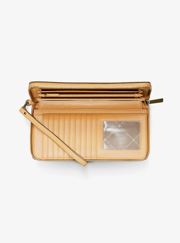 Michael Kors Jet Set Travel Large Pebbled Leather Wristlet in Honeywheat