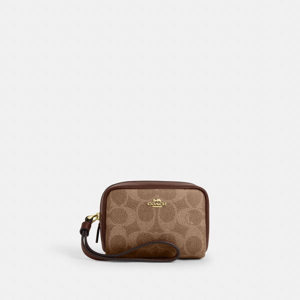 Coach Pouch Wristlet In Signature Canvas Brass/Tan/Brown official image A0