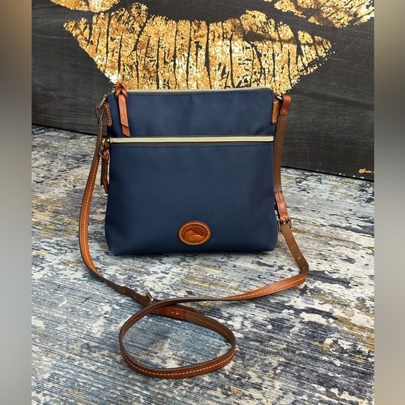 Dooney Bourke Charleston crossbody bag navy blue 2026