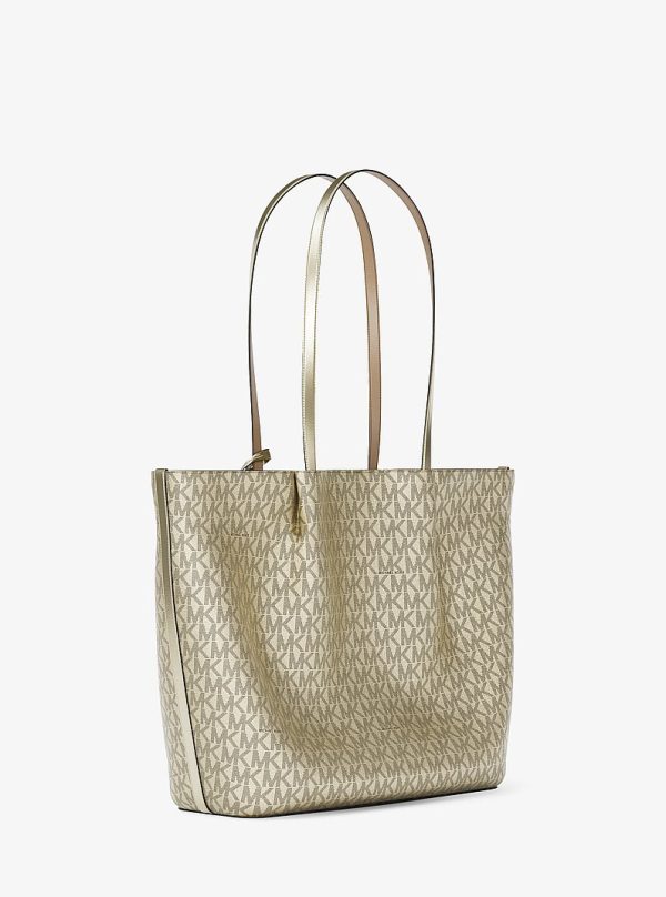 Michael Kors Carson Large Metallic Signature Logo Tote Bag in Pale Gold, side profile view