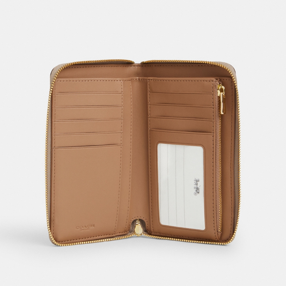 Coach Outlet Medium ID Zip Wallet In Signature Canvas - Preorder