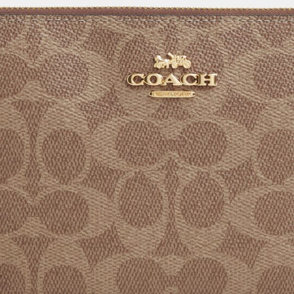 Coach Outlet Large Corner Zip Wristlet In Signature Canvas - Preorder