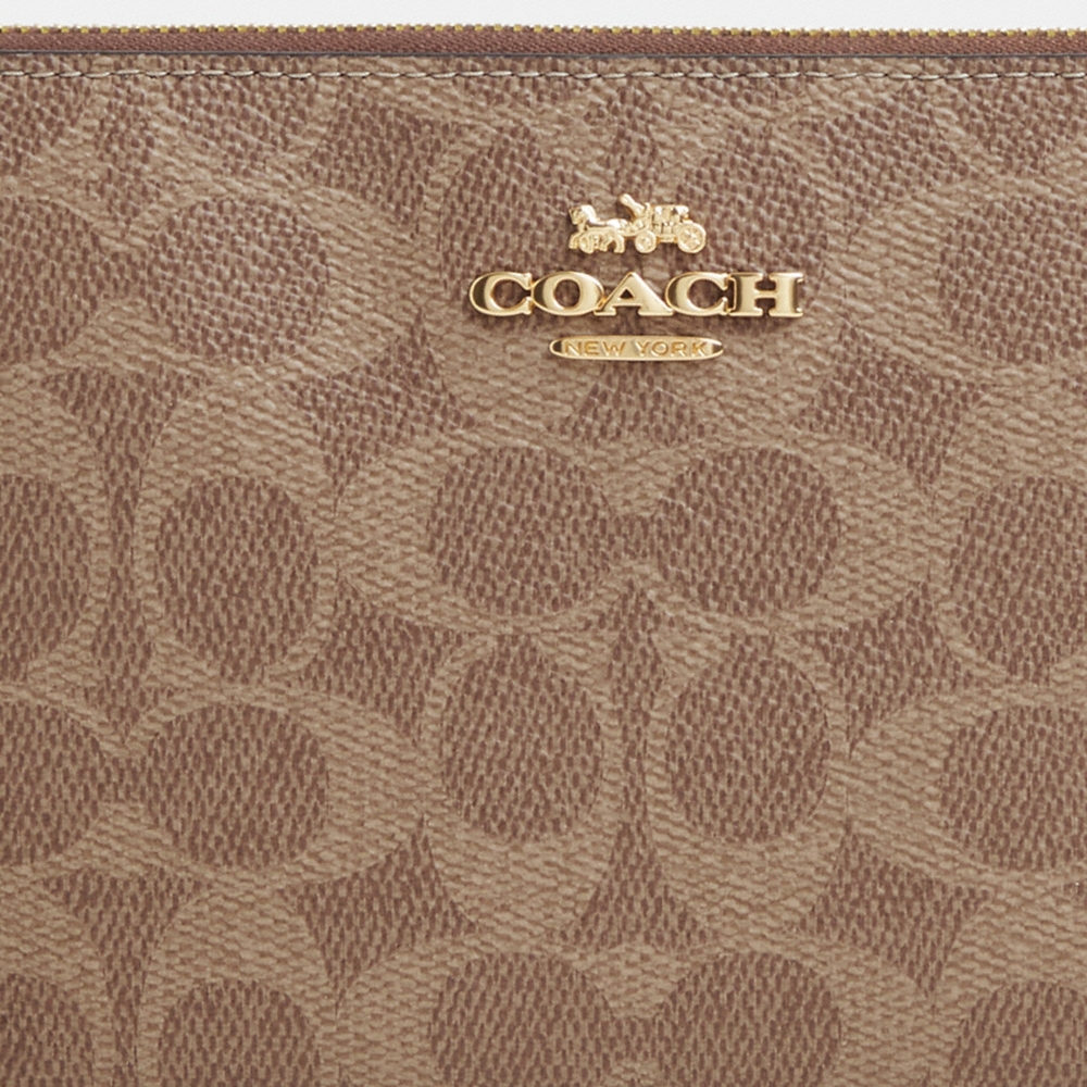 Coach Outlet Large Corner Zip Wristlet In Signature Canvas - Preorder