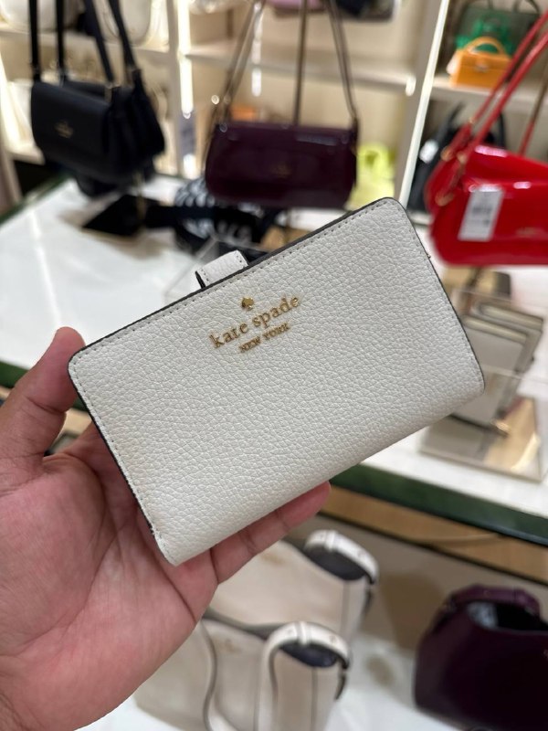 Kate Spade Medium Bifold Wallet - Preorder — Meringue (100)