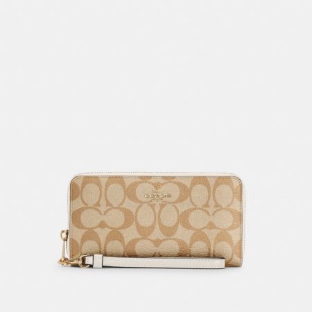 Coach Outlet Long Zip Around Wallet In Signature Canvas - Preorder — Brass/Light Khaki Chalk