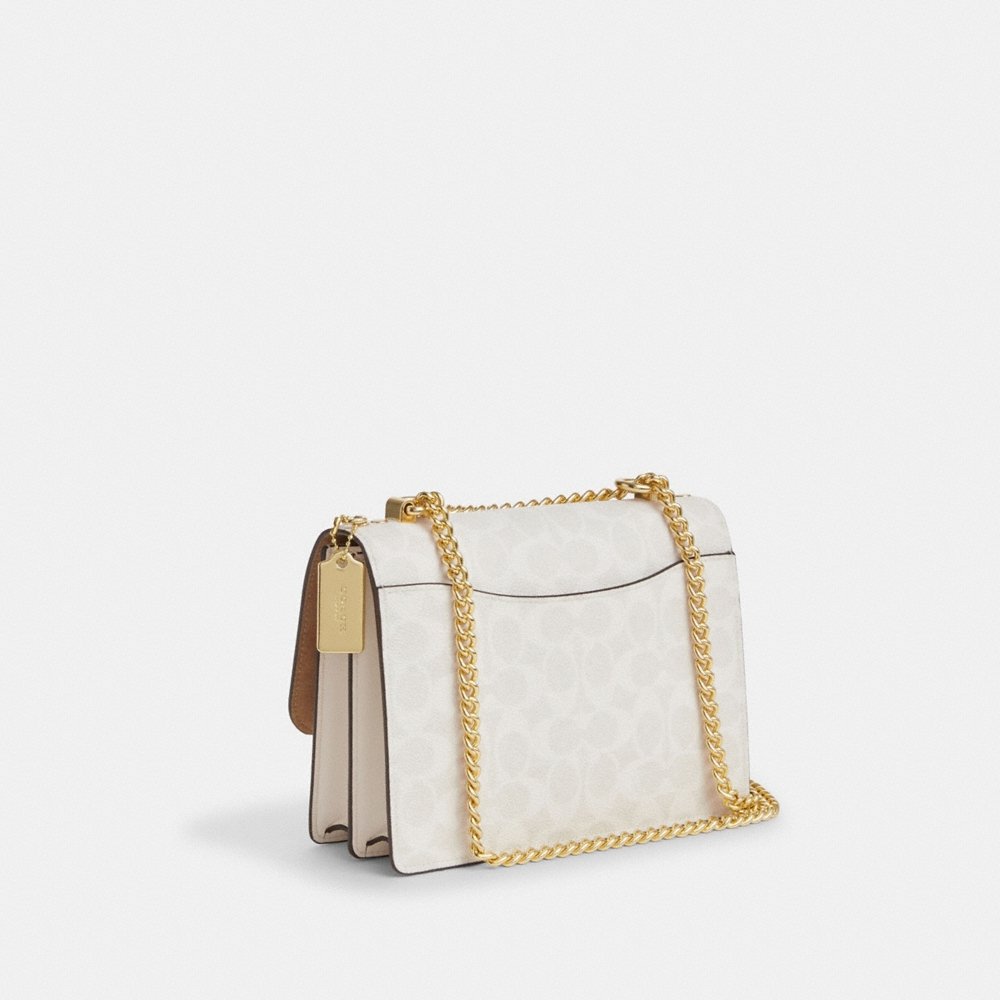 Coach Outlet Klare Crossbody Bag In Signature Canvas - Preorder