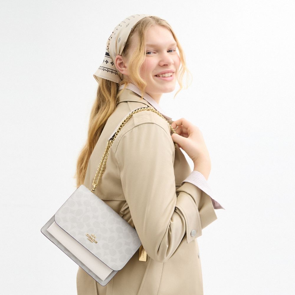 Coach Outlet Klare Crossbody Bag In Signature Canvas - Preorder