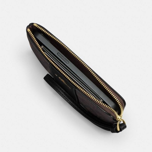 Coach Outlet Corner Zip Wristlet In Signature Canvas With Floral Print - Preorder