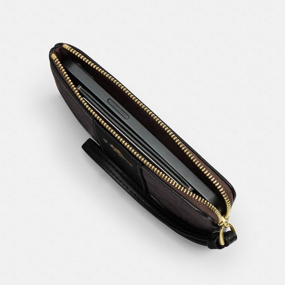Coach Outlet Corner Zip Wristlet In Signature Canvas With Floral Print - Preorder