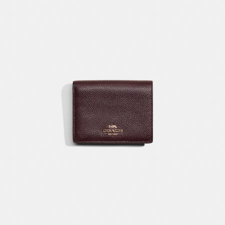 Coach Restored Small Snap Wallet - Preorder — Brass/Oxblood