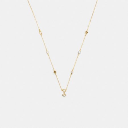 Coach Outlet Pearl Charm Necklace - Preorder — Brass/Pearl