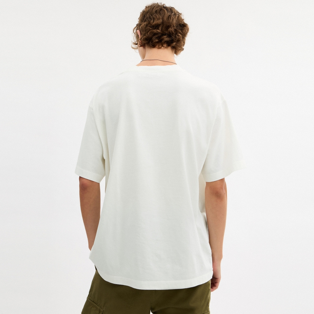 Coach Outlet Collage Train Relaxed T-Shirt In Organic Cotton - Preorder