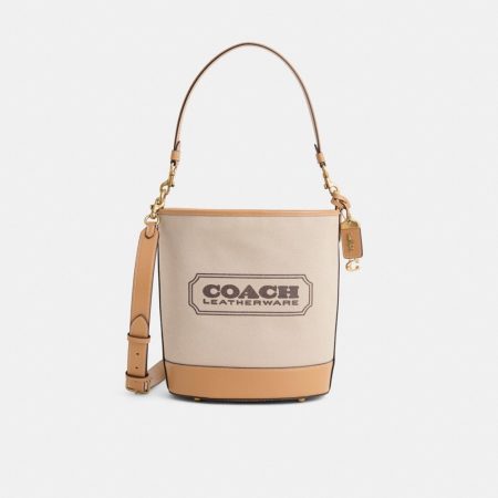 Coach Restored Dakota Bucket Bag - Preorder — Brass/Natural Canvas/Tan