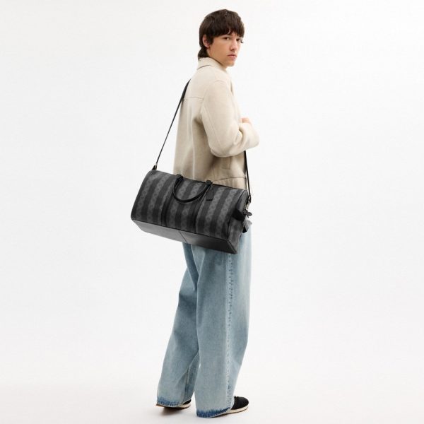 Coach Outlet Venturer Bag In Signature Canvas With Stripes - Preorder
