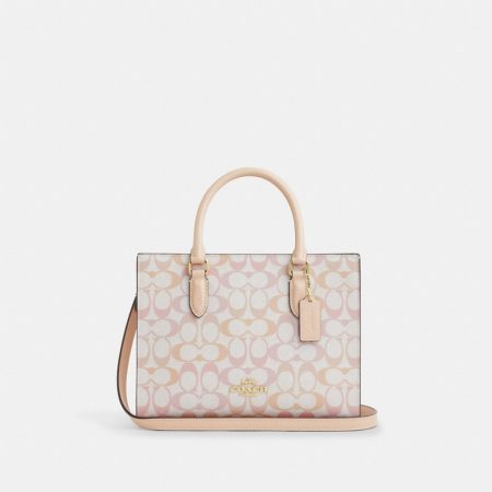 Coach Outlet Maggie Small Tote Bag In Signature Canvas - Preorder — Brass/Chalk/Pink