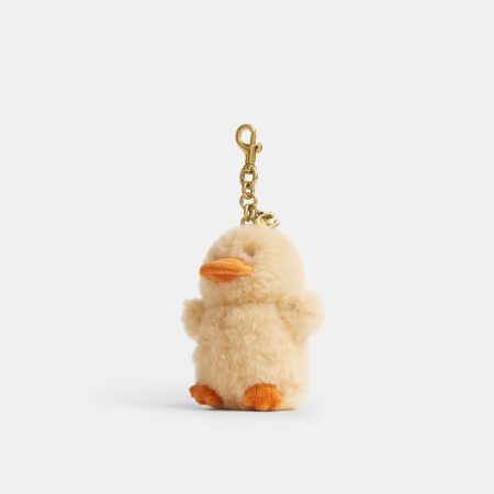 Coach Ducky Bag Charm In Shearling - Preorder — Brass/Yellow Multi