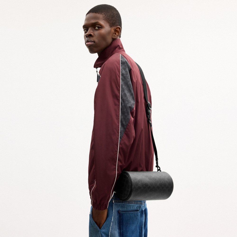 Coach Outlet Andre Barrel Bag 24 In Signature Canvas - Preorder