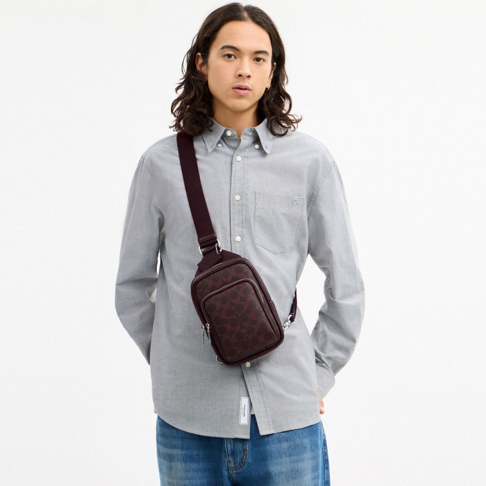 Coach Outlet Racer Sling Pack In Signature Canvas - Preorder