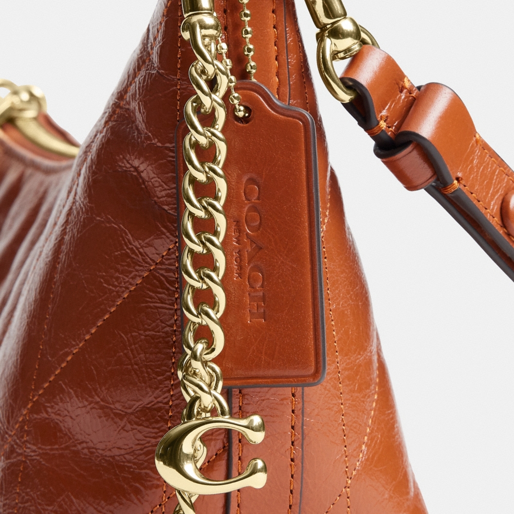 Coach Outlet Caitlin Shoulder Bag With Quilting And Charm - Preorder