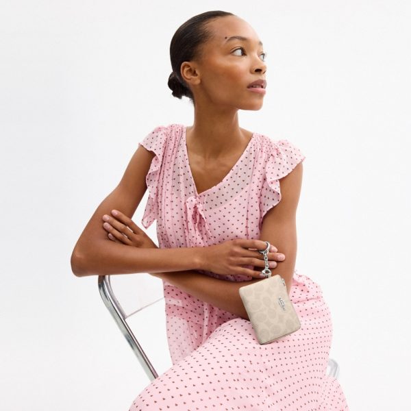 Coach Outlet Small Corner Zip Wallet In Signature Canvas - Preorder