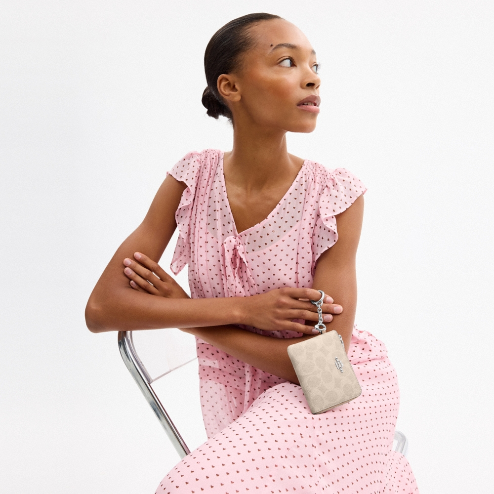 Coach Outlet Small Corner Zip Wallet In Signature Canvas - Preorder