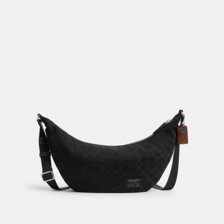 Coach Outlet Leon Sling Bag In Signature Nylon Jacquard - Preorder — Black