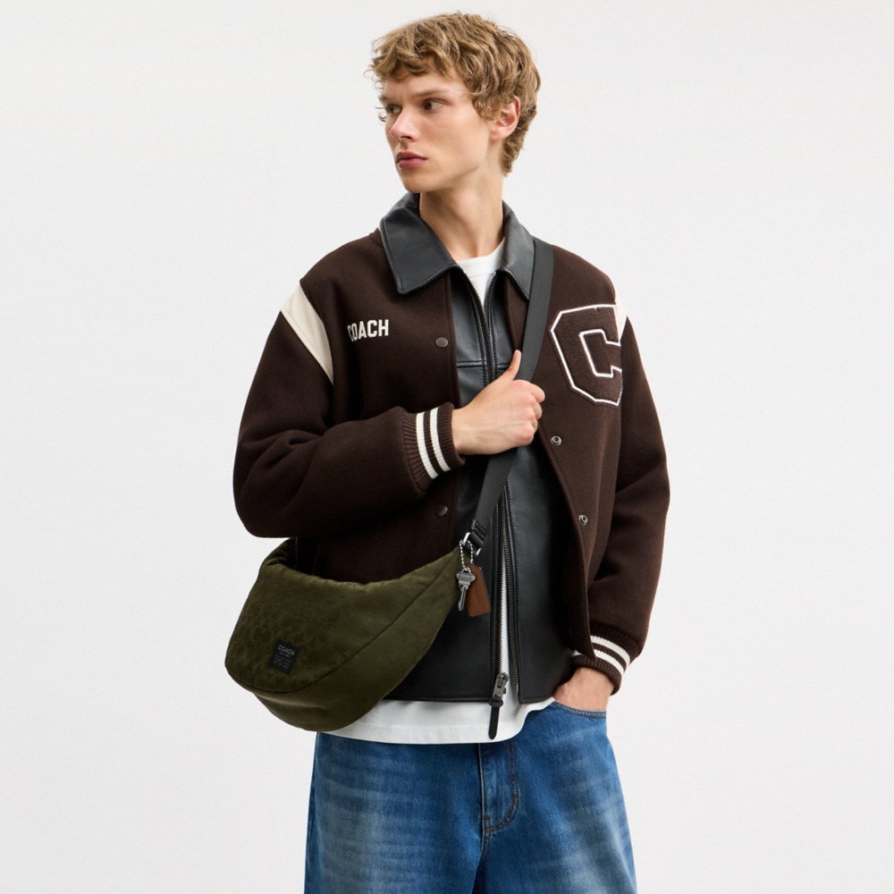 Coach Outlet Leon Sling Bag In Signature Nylon Jacquard - Preorder