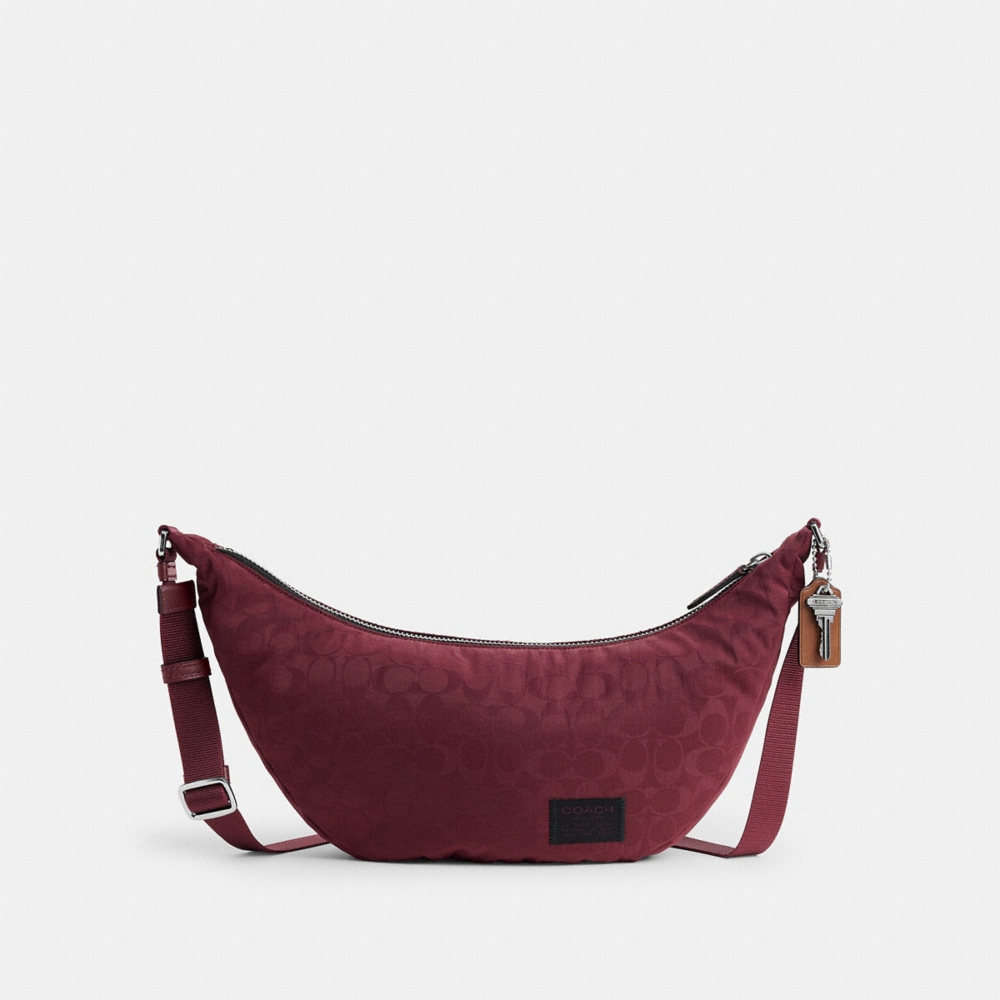Coach Outlet Leon Sling Bag In Signature Nylon Jacquard - Preorder