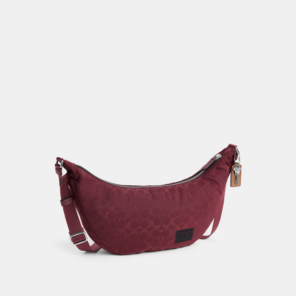 Coach Outlet Leon Sling Bag In Signature Nylon Jacquard - Preorder