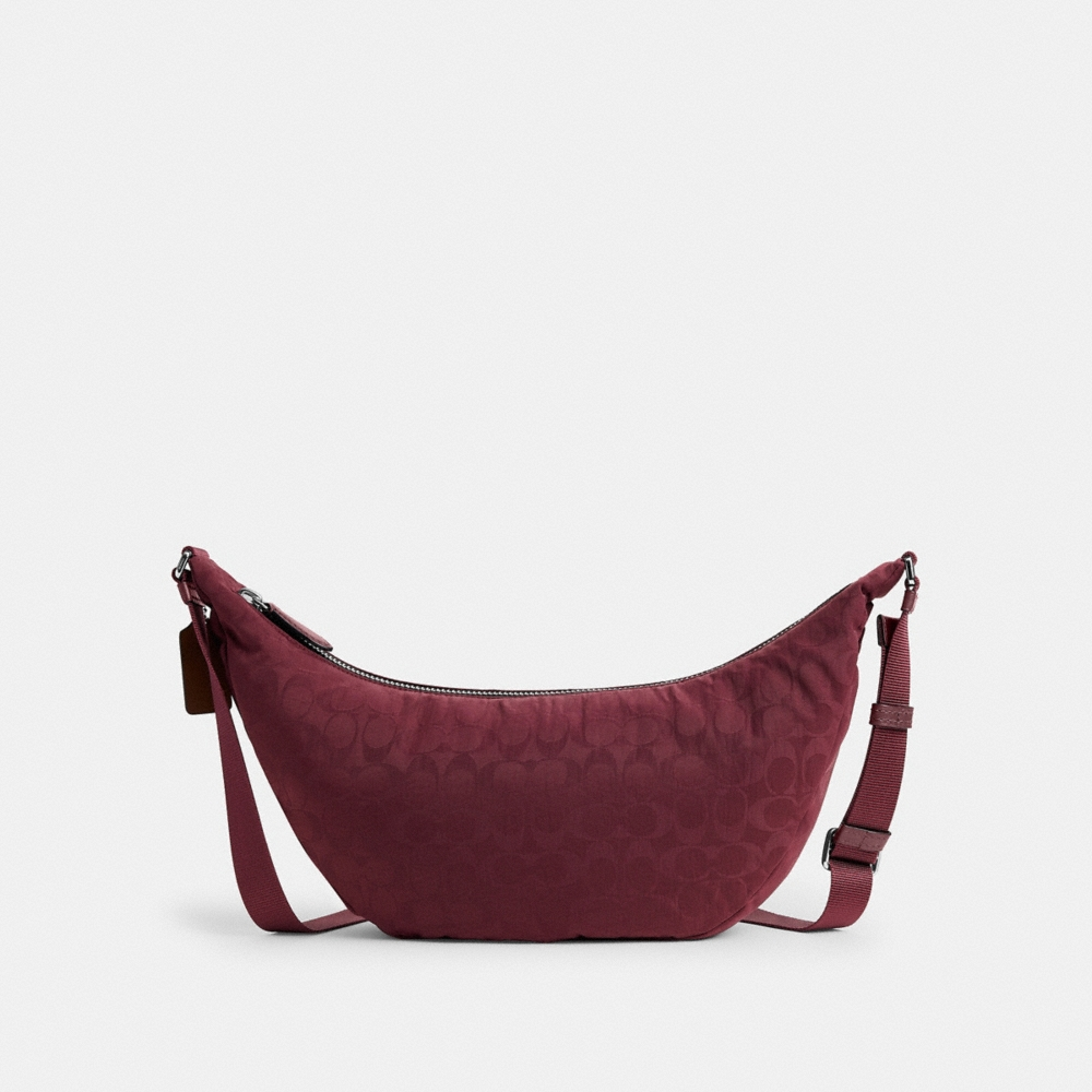 Coach Outlet Leon Sling Bag In Signature Nylon Jacquard - Preorder