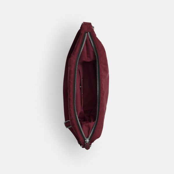 Coach Outlet Leon Sling Bag In Signature Nylon Jacquard - Preorder