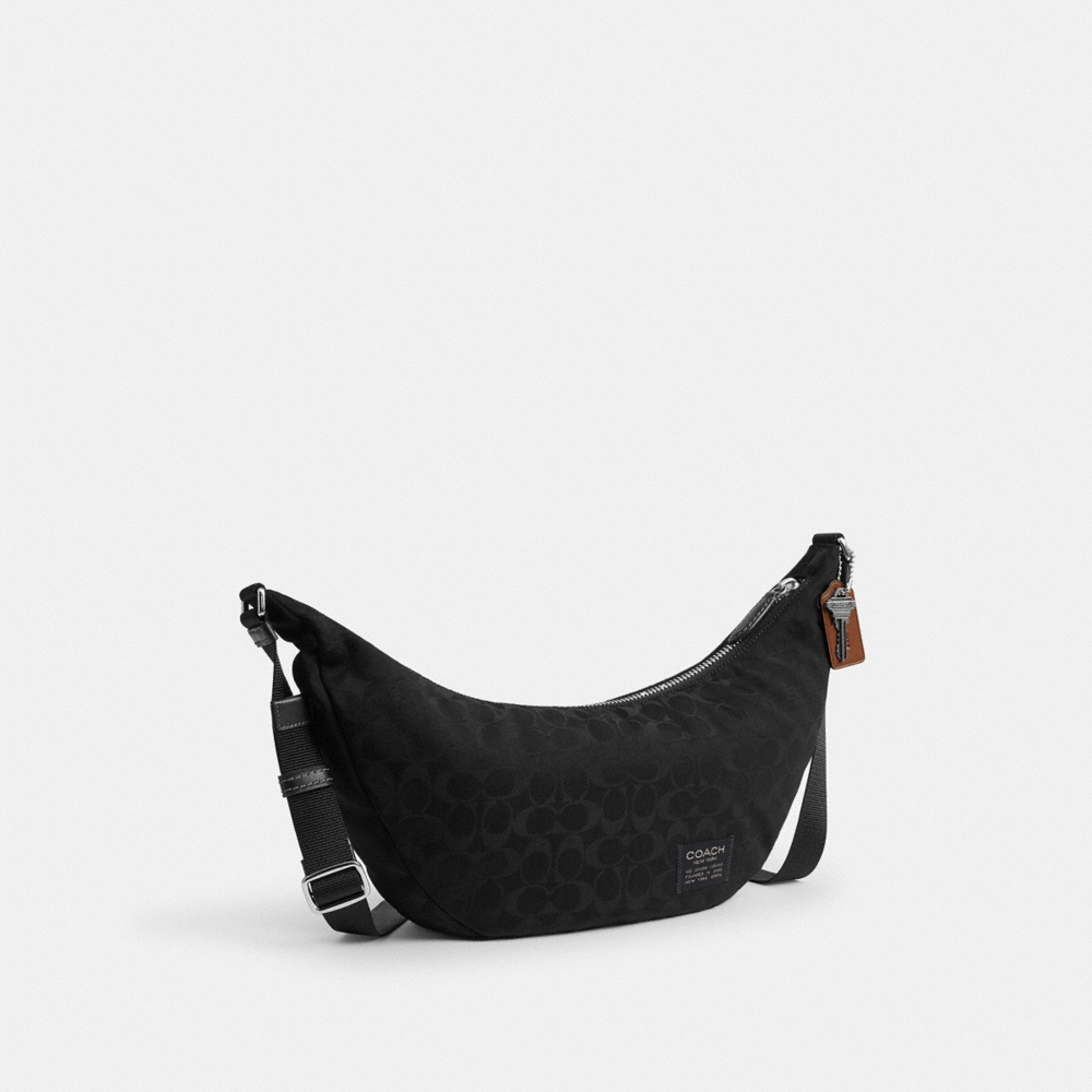 Coach Outlet Leon Sling Bag In Signature Nylon Jacquard - Preorder