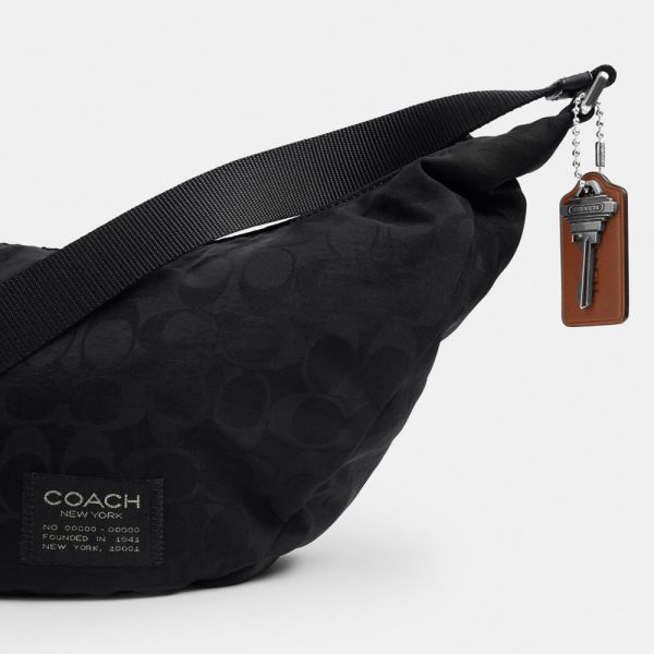 Coach Outlet Leon Sling Bag In Signature Nylon Jacquard - Preorder