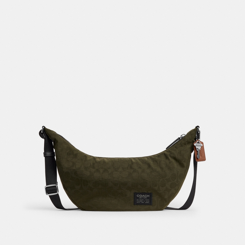 Coach Outlet Leon Sling Bag In Signature Nylon Jacquard - Preorder