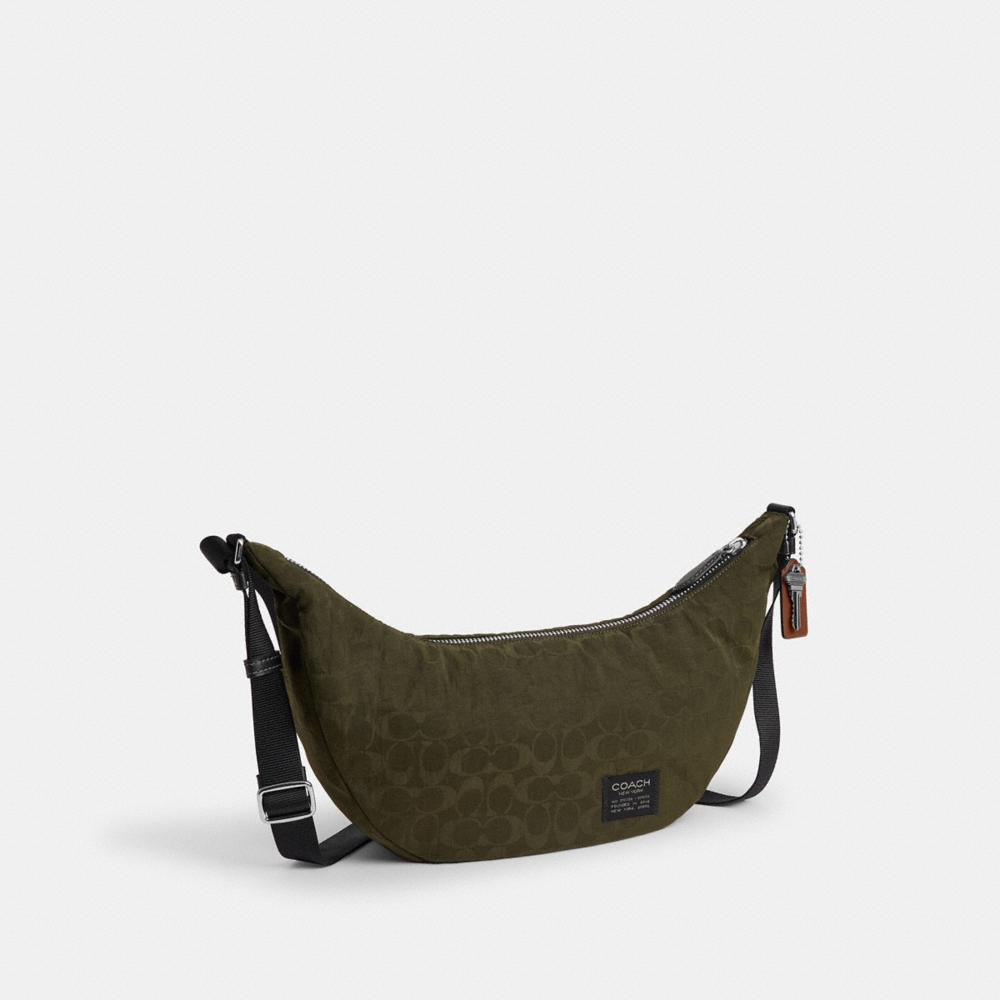 Coach Outlet Leon Sling Bag In Signature Nylon Jacquard - Preorder
