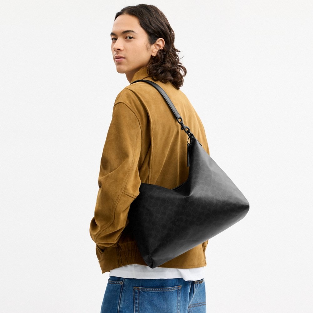 Coach Outlet Laurel Bag 36 In Signature Canvas - Preorder