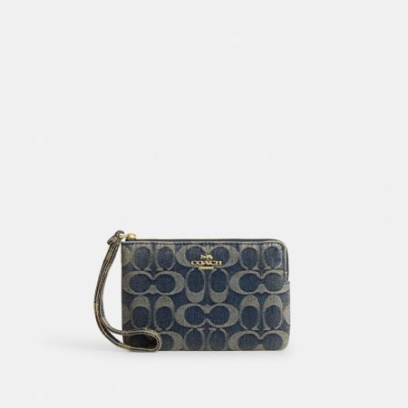 Coach Outlet Corner Zip Wristlet In Signature Regenerative Cotton Denim - Preorder — Brass/Denim