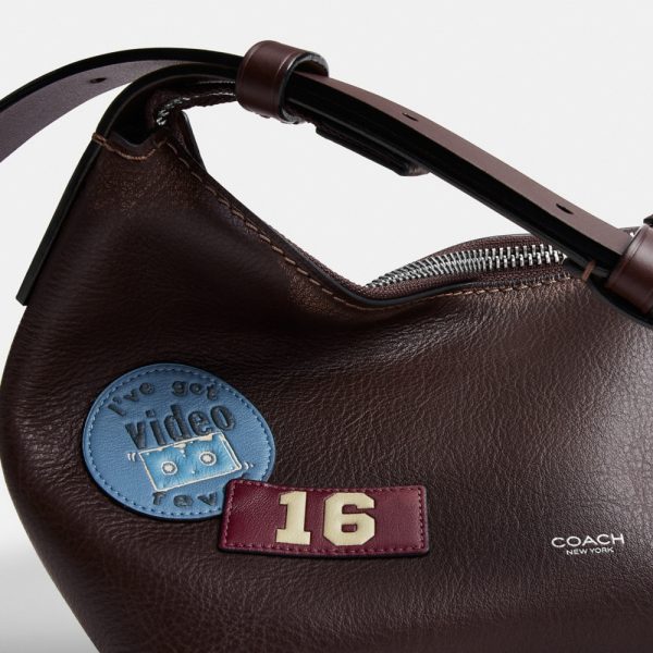 Coach Outlet Mott Sling Bag 22 In Loved Leather With Stickers - Preorder