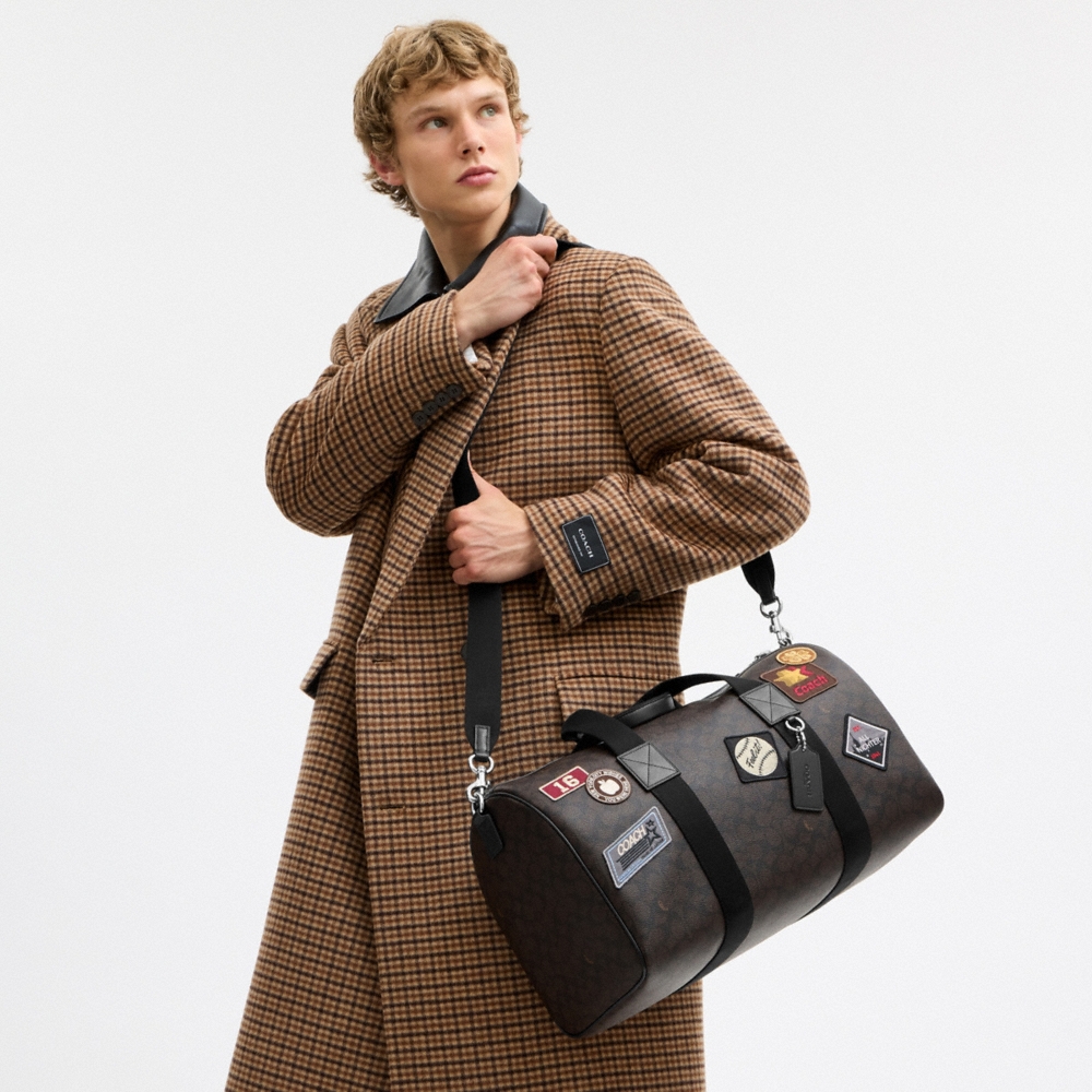 Coach Outlet Explorer Duffle Bag 45 In Signature Canvas With Patches - Preorder