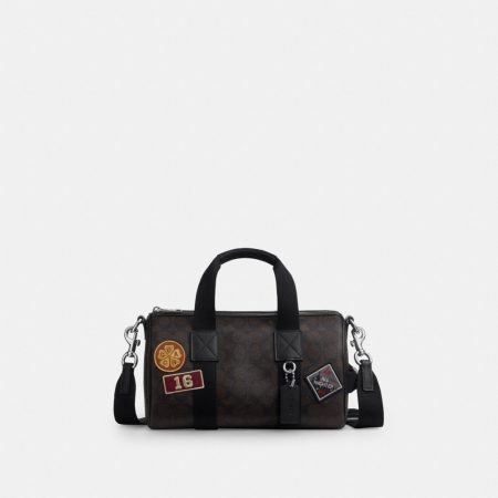 Coach Outlet Explorer Duffle Bag 28 In Signature Canvas With Patches - Preorder — Silver/Walnut/Black