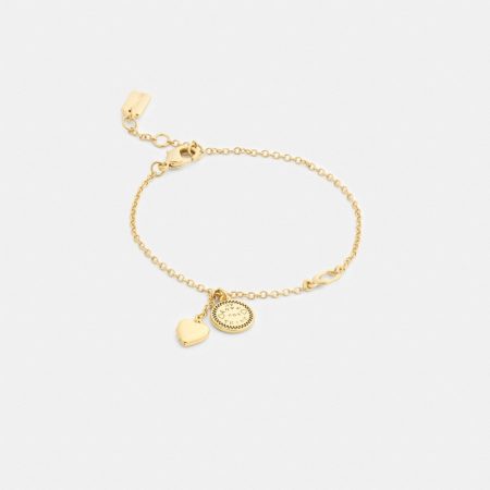 Coach Heart And Coin Linear Bracelet - Preorder — Brass