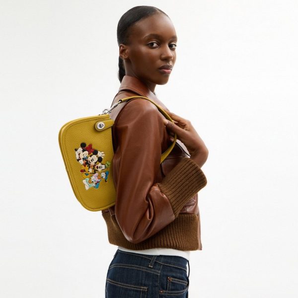Coach Disney X Coach Swinger Bag In Regenerative Leather With Mickey Mouse And Friends - Preorder