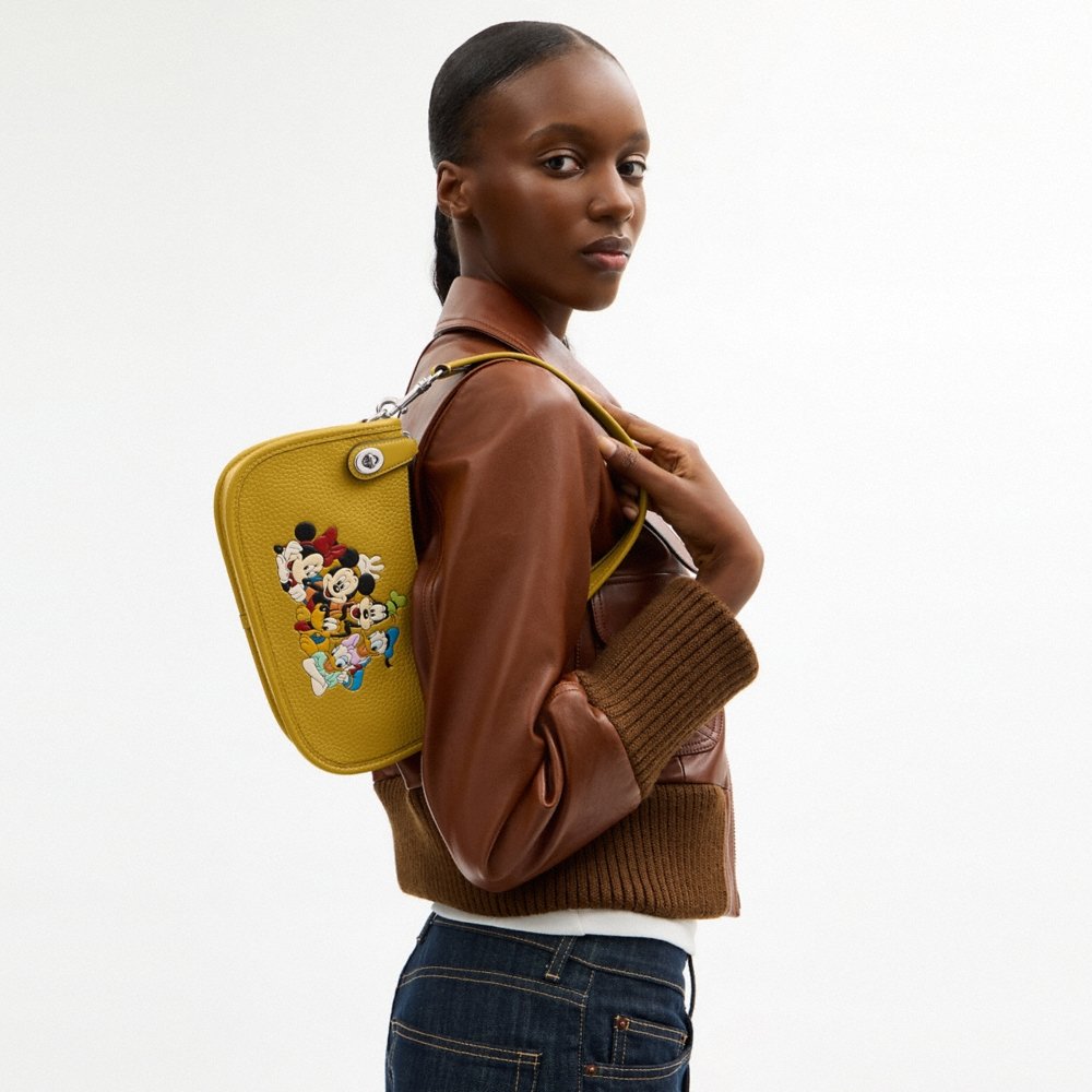 Coach Disney X Coach Swinger Bag In Regenerative Leather With Mickey Mouse And Friends - Preorder