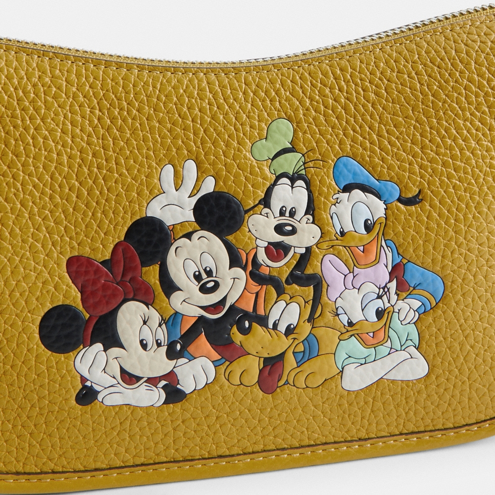 Coach Disney X Coach Swinger Bag In Regenerative Leather With Mickey Mouse And Friends - Preorder