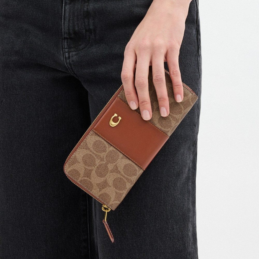 Coach Outlet Essential Slim Accordion Zip Wallet In Signature Canvas - Preorder