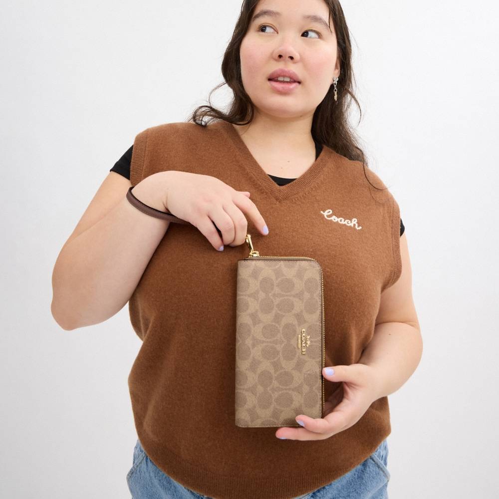 Coach Outlet Long Zip Around Wallet In Signature Canvas - Preorder