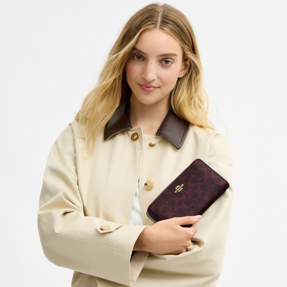 Coach Outlet Long Zip Around Wallet In Signature Canvas - Preorder